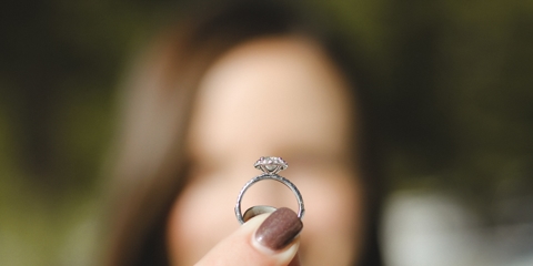woman holding ring